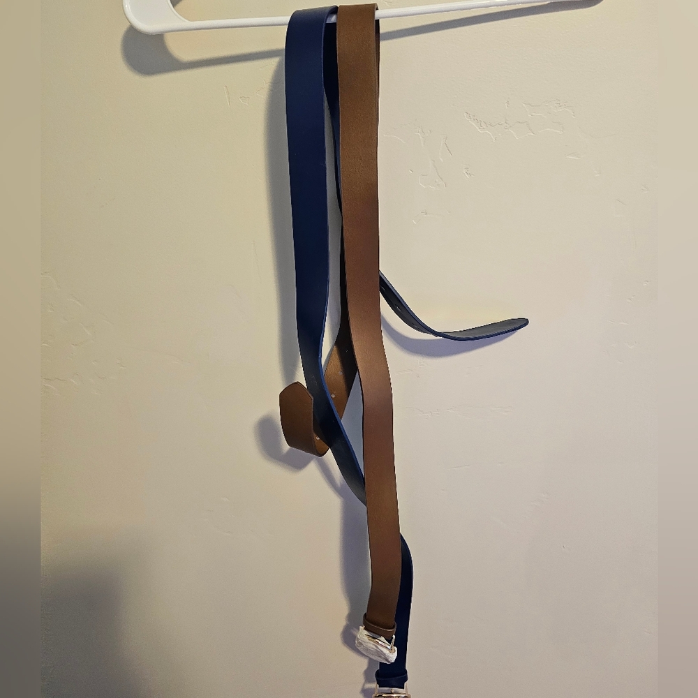 Two belts, never worn brand new.